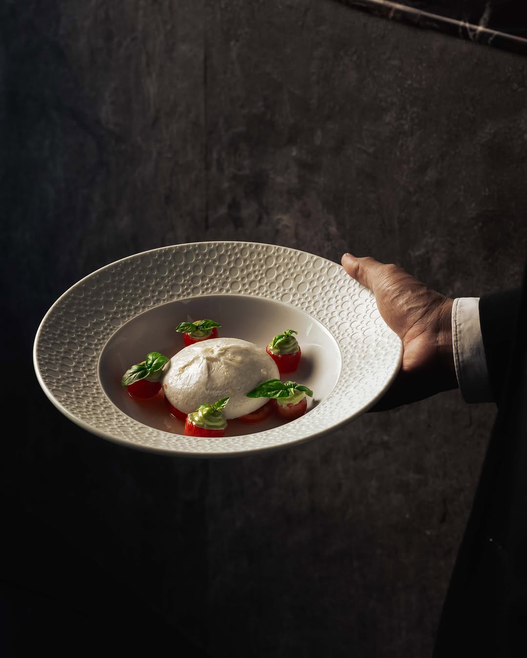 Burrata with heirloom tomatoes being served at Brontë